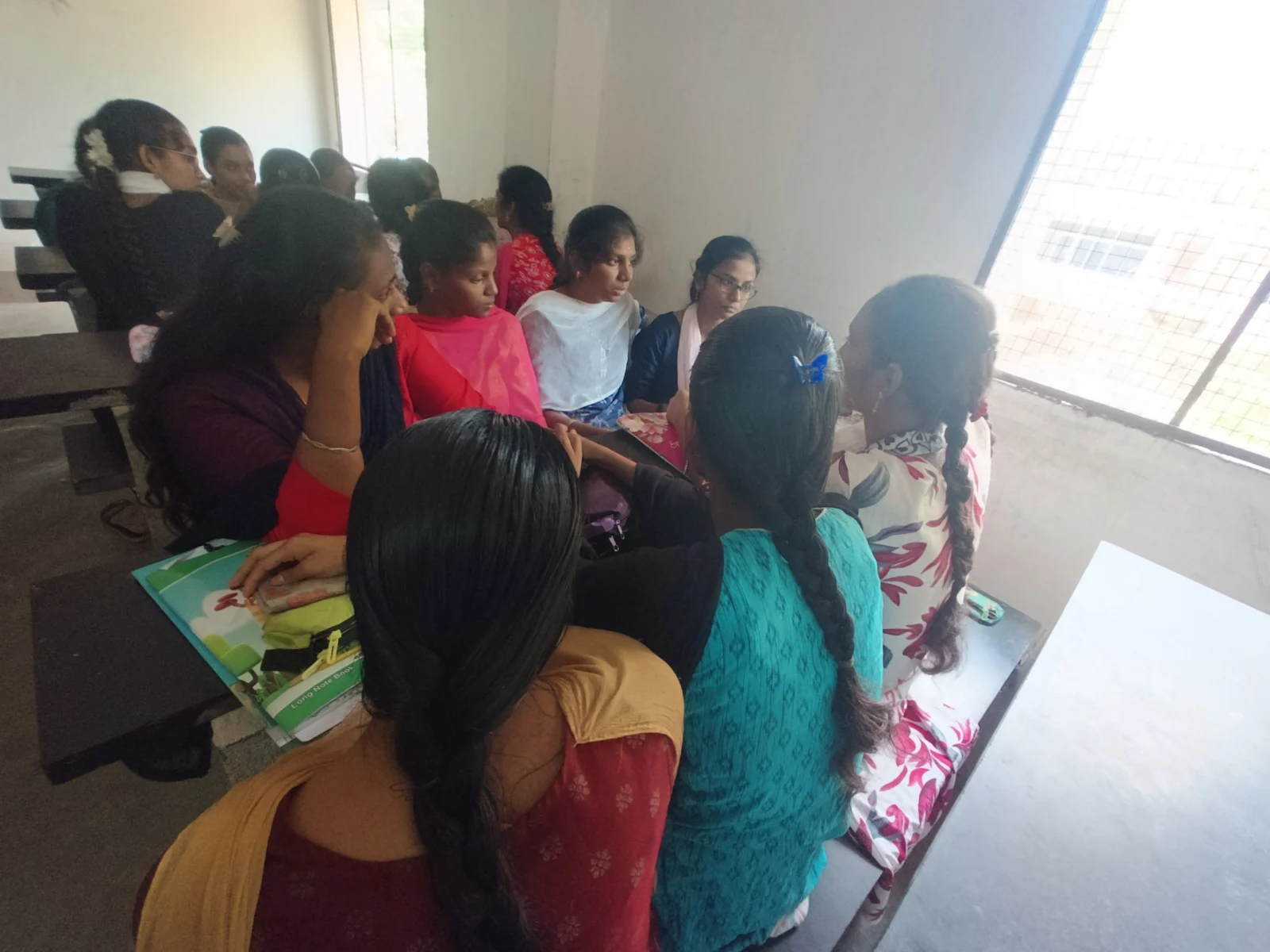 Students in a group discussion at Prathibha College